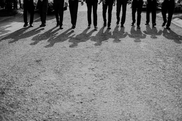 groom and groomsmen walking
