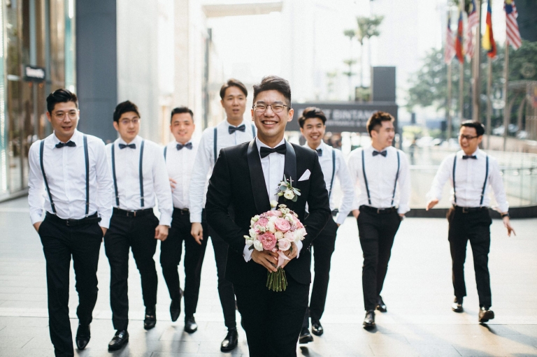 Groom and groomsmen at pavillion